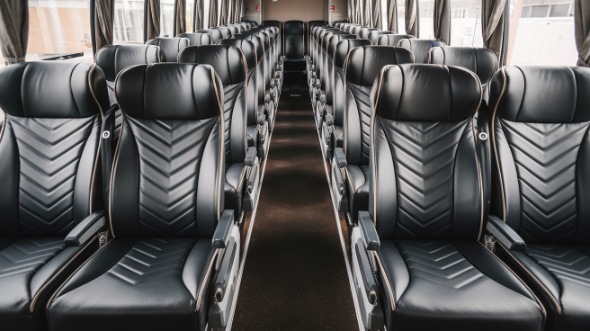 56 passenger charter bus rental muncie