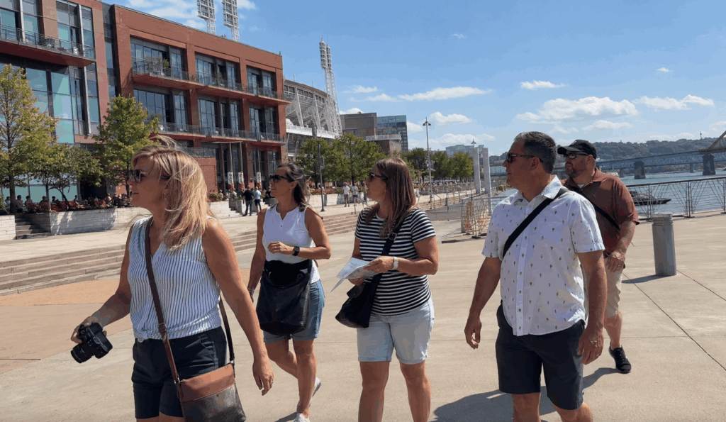 group visiting cincinnati riverfront near the ballpark during an indianapolis day trip